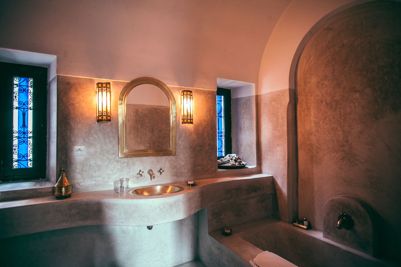 Moroccan-style bathroom renovation with tadelakt and brass fittings