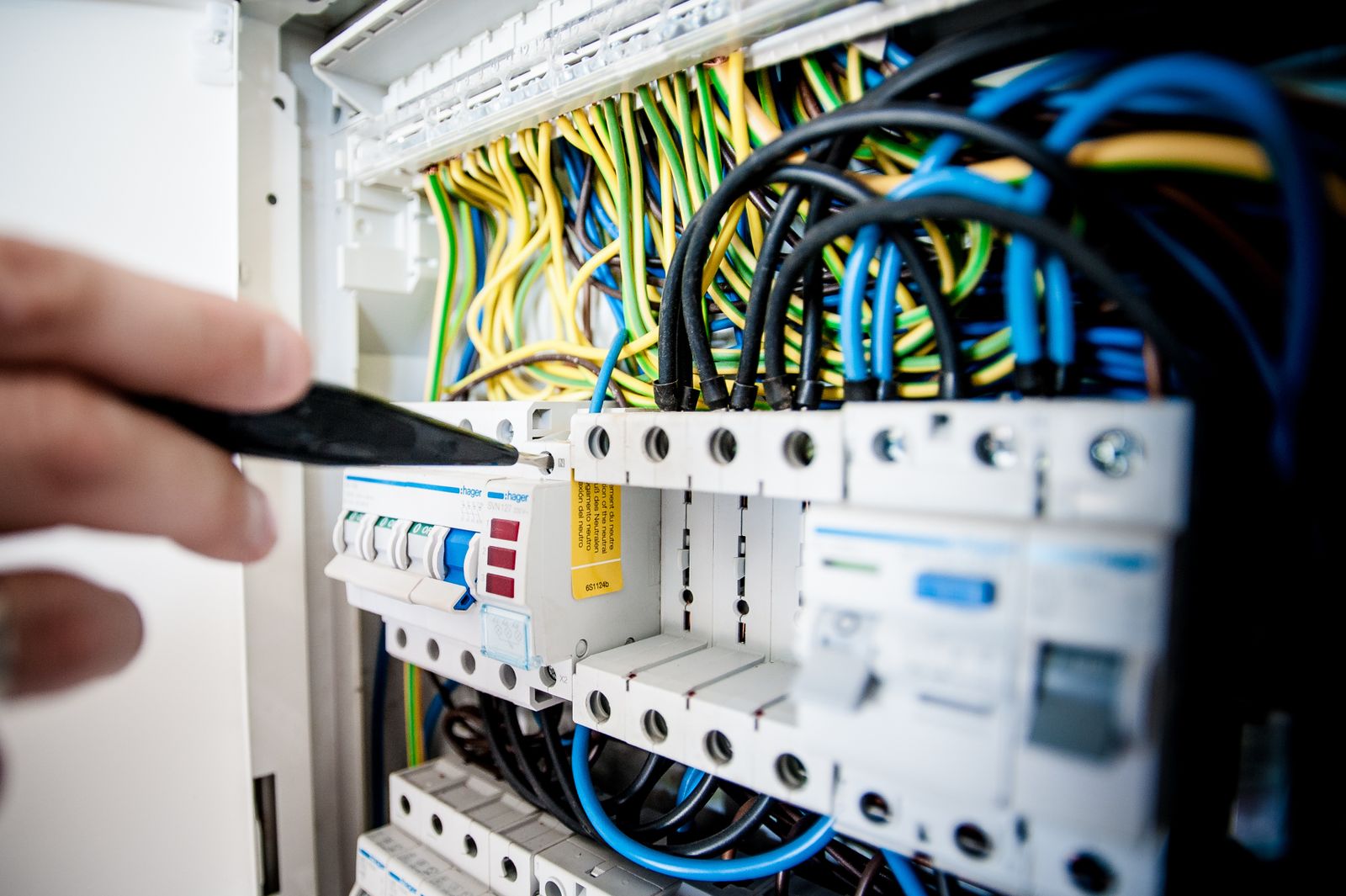 Electrician installing wiring in a Dubai home